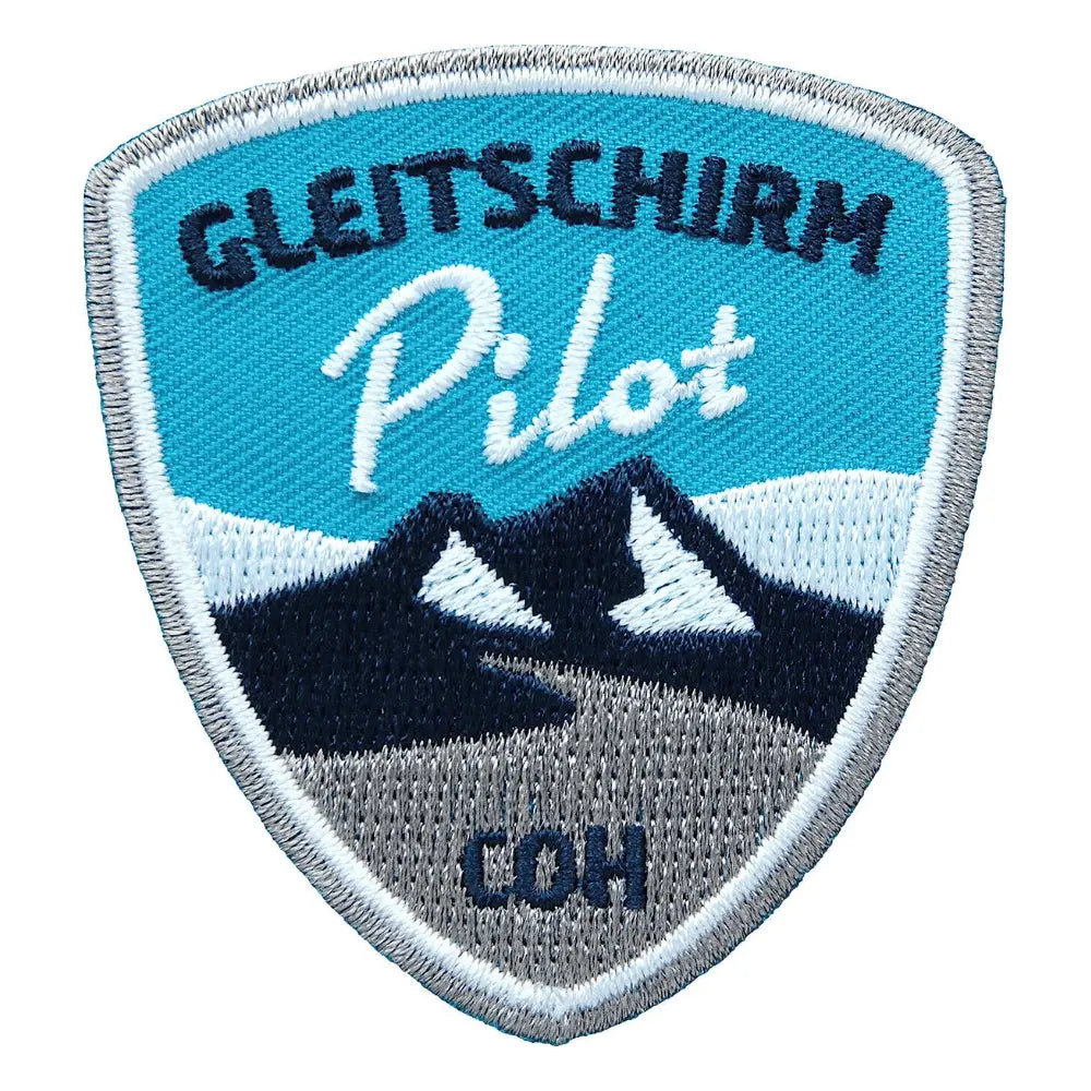 Paragliding Pilot Sticker zum Aufnähen oder Aufbügeln, zeigt ein hochwertiges Gleitschirm-Motiv, ideal für Jacken oder Rucksäcke von Paragliding-Enthusiasten.