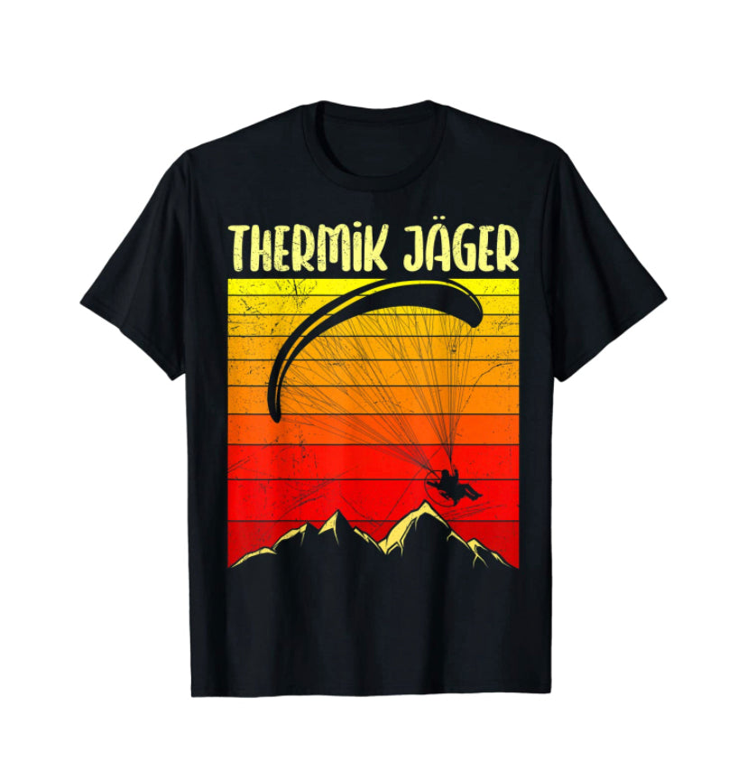 Paragliding T-Shirt Thermik Jäger mit Grafikdesign eines Mannes beim Paragliden; ideal für Gleitschirmflieger, aus 100% Baumwolle, klassisch geschnitten.