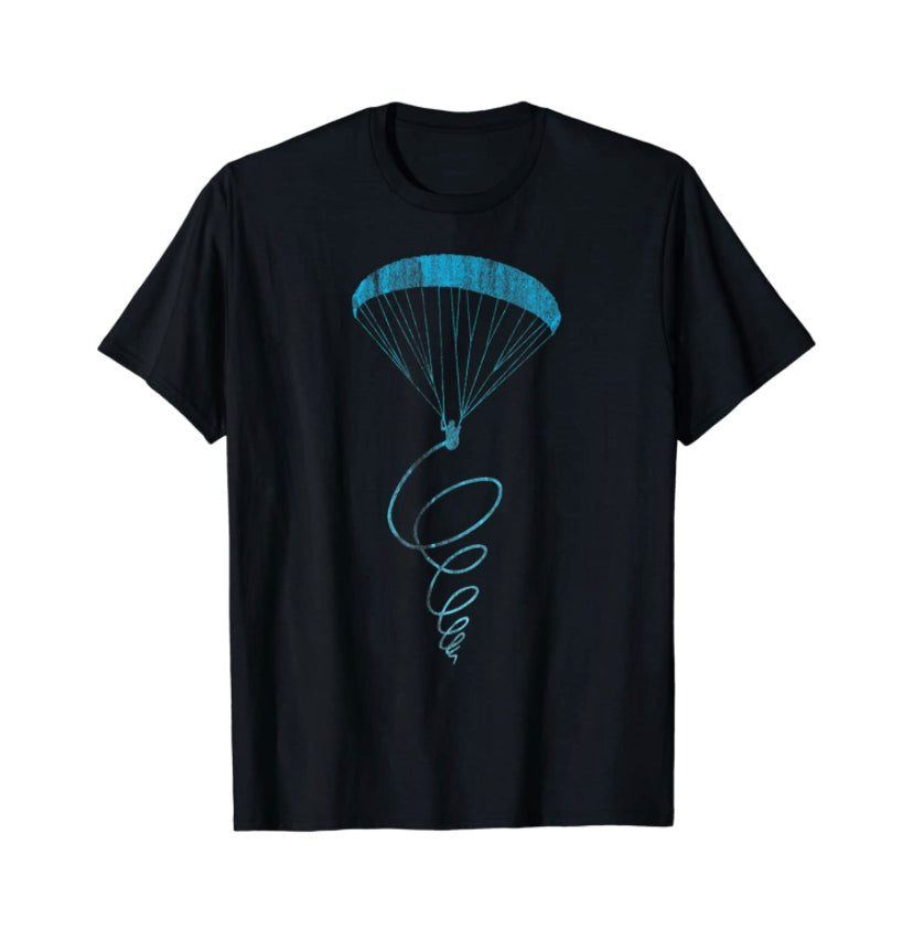 Paragliding T-Shirt Thermik mit blauem Fallschirm-Design, ideal für Gleitschirmflieger. Perfekt für Piloten und Sportliebhaber, 100% Baumwolle.