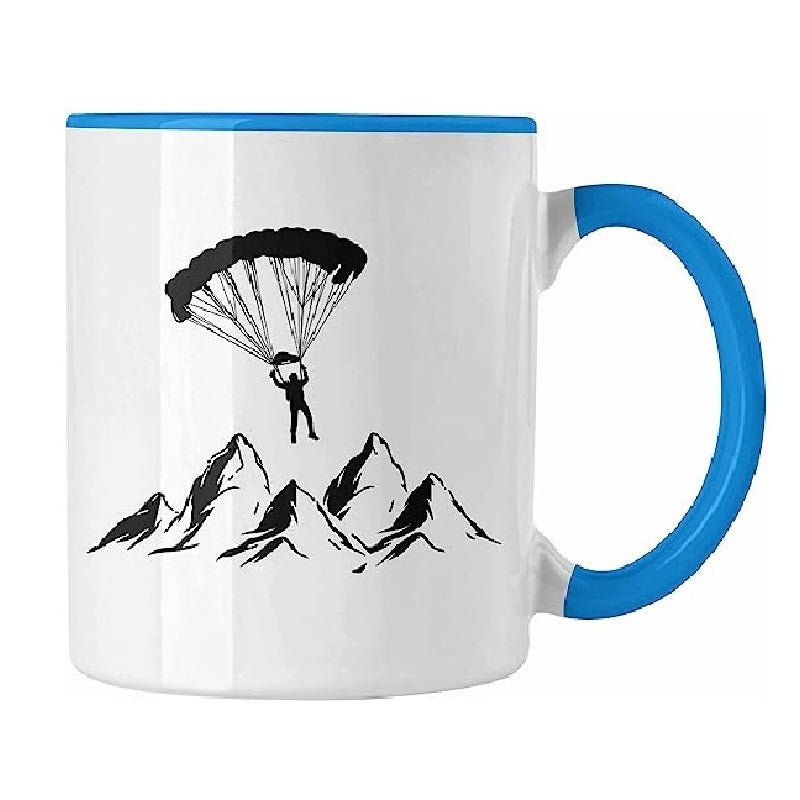 Gleitschirm Kaffee Tasse Paragliding Berge mit Motiv eines fallenden Gleitschirmfliegers, ideal für Gleitschirmflieger-Fans, beidseitig bedruckt und spülmaschinenfest.