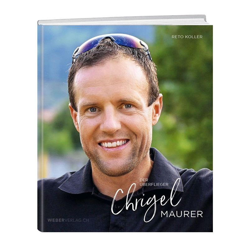 Chrigel Maurer - Der Überflieger: Buchcover mit lächelndem Mann und Sonnenbrille auf dem Kopf, persönlich signiert. Abenteuer und Erfolge des Paragliding-Champions.