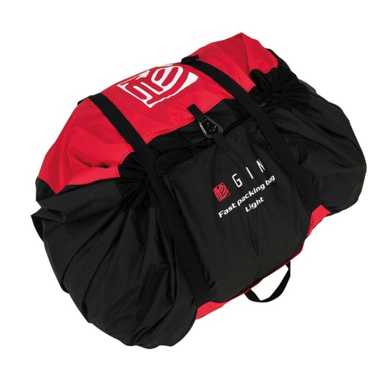 GIN Fast Packing Bag 2 mit Tragesystem und Kompressionsbändern, ideal zum schnellen Verstauen von Gleitschirmen. Praktischer Schnellpacksack für Ausbildung und Outdoor-Aktivitäten.