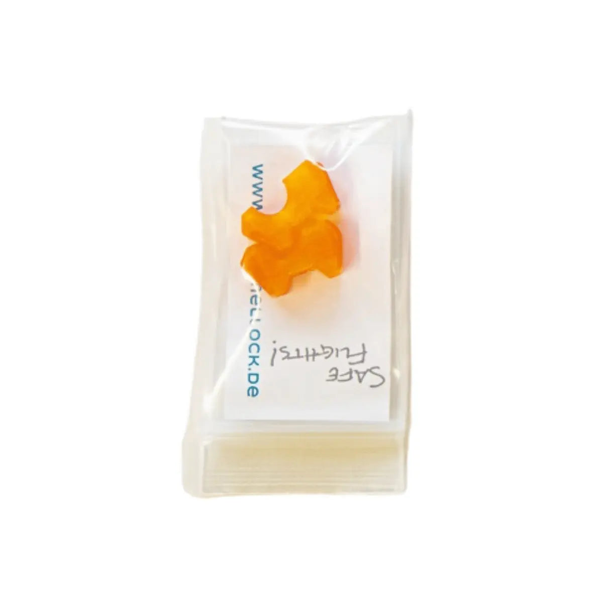 Small orange safety accessory in clear plastic packaging labeled with instructions, designed for secure fastening in paragliding equipment, Brummellock - Brummelhaken Sicherung