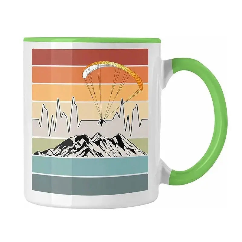 Gleitschirm Kaffee Tasse Rainbow mit Berg- und Gleitschirmmotiv, ideal für Paragliding-Fans. Spülmaschinenfest, beidseitig bedruckt, aus Keramik, 330ml Kapazität.