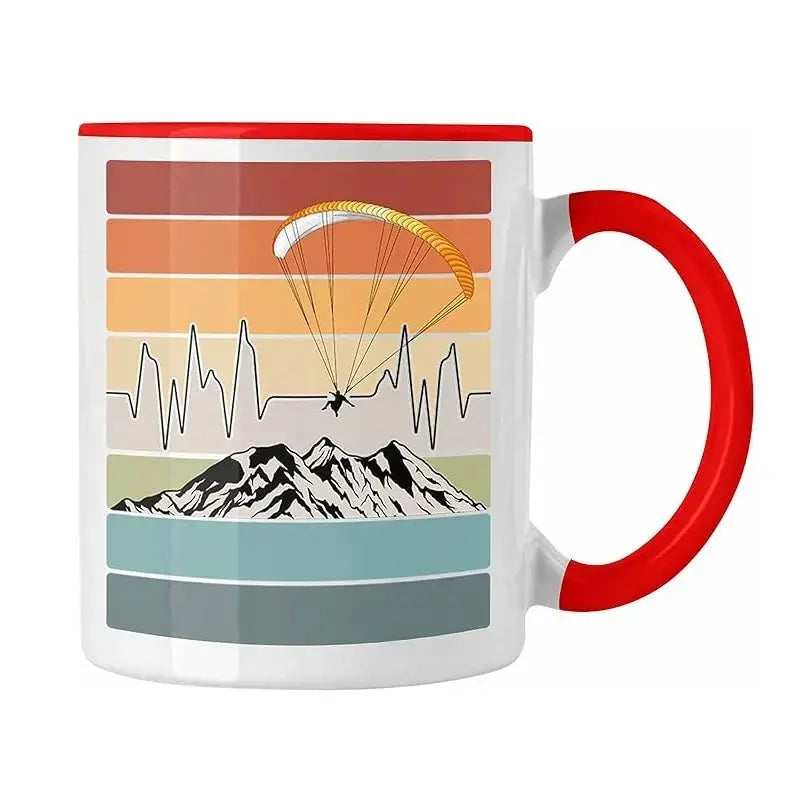 Gleitschirm Kaffee Tasse Rainbow mit Berg- und Gleitschirmmotiv, ideal für Paragliding-Fans. Hergestellt aus Keramik, 330ml, spülmaschinenfest und mikrowellentauglich.