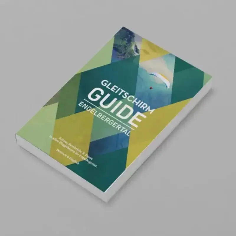 Gleitschirm Mini-Guide – Engelbergertal: Buch mit farbenfrohem Design, bietet umfassende Informationen zu Fluggebieten, Start- und Landeplätzen im Engelbergertal für Paraglider.