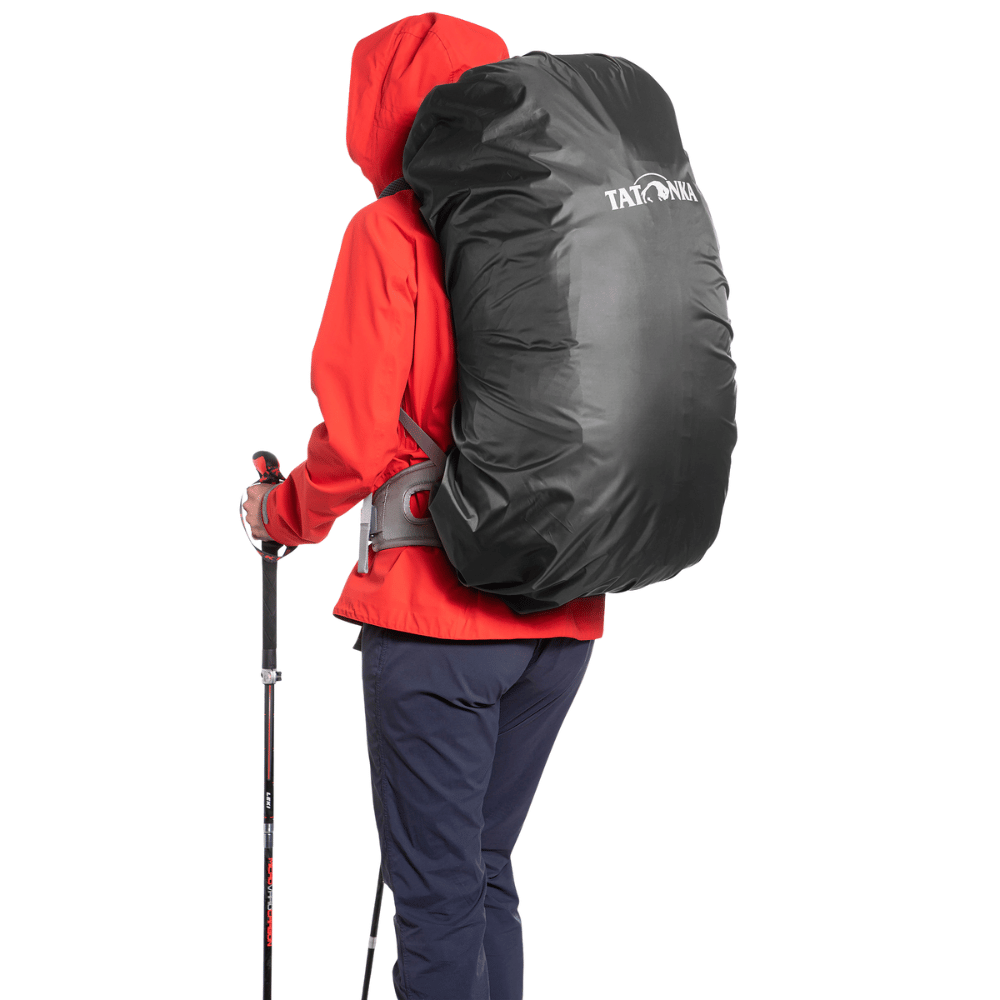 Tatonka Rucksack Regenhülle 70-90L, schwarze Schutzhülle, schützt Rucksäcke vor Regen, aus wasserdichtem T-Cover Tex, ideal für Paragliding-Zubehör bei Paragliding24.ch.