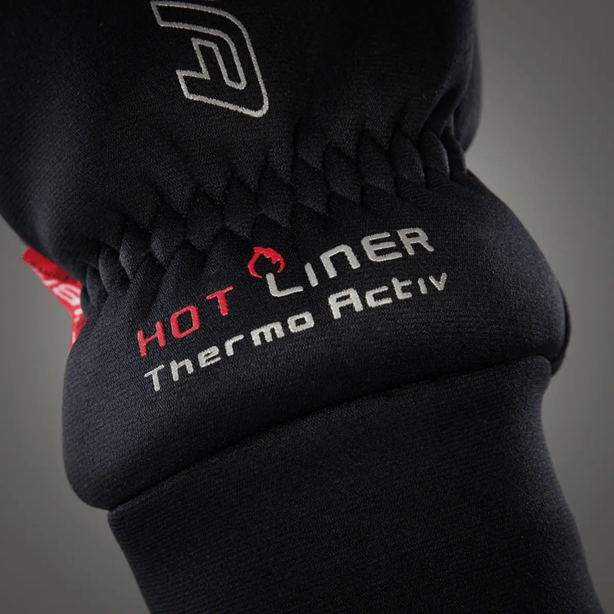 Schwarzer Chiba Thermo Aktiv Hot-Liner Handschuh mit rotem Logo und elastischem Bund.
