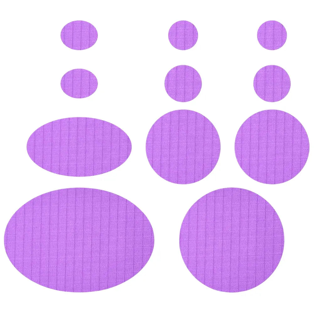 Daunenjacken Reparatur Set light Purple selbstklebend, bestehend aus runden und ovalen Flicken, ideal für schnelle Reparaturen an Jacken, Skihosen und Schlafsäcken.