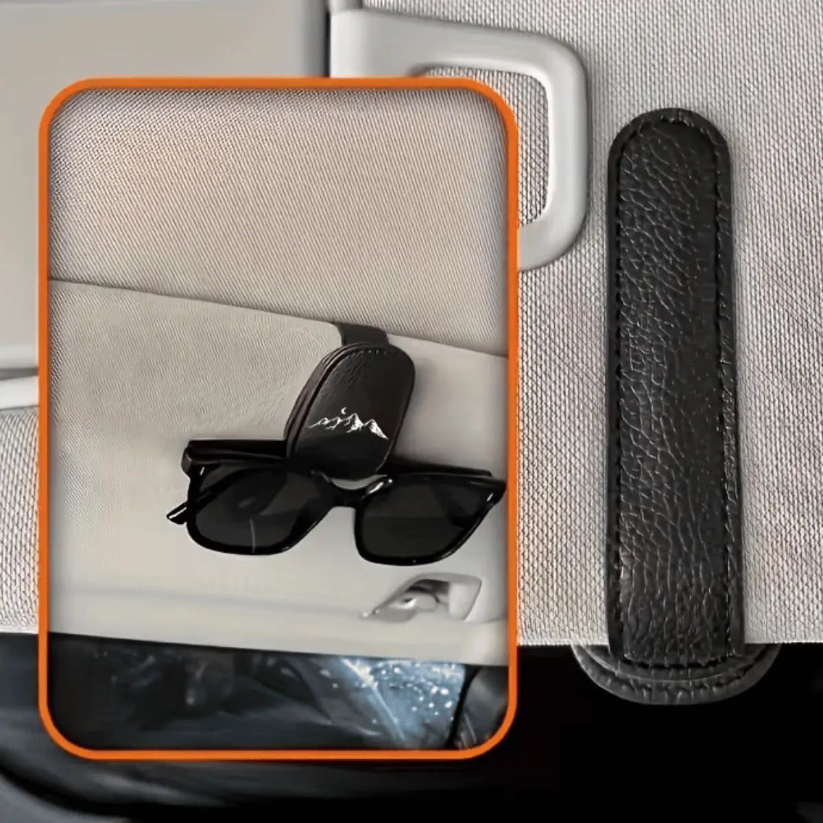 Schwarzer Leder-Brillenhalter für das Auto mit Bergmotiv, befestigt an einem Autositz, hält eine Sonnenbrille.
