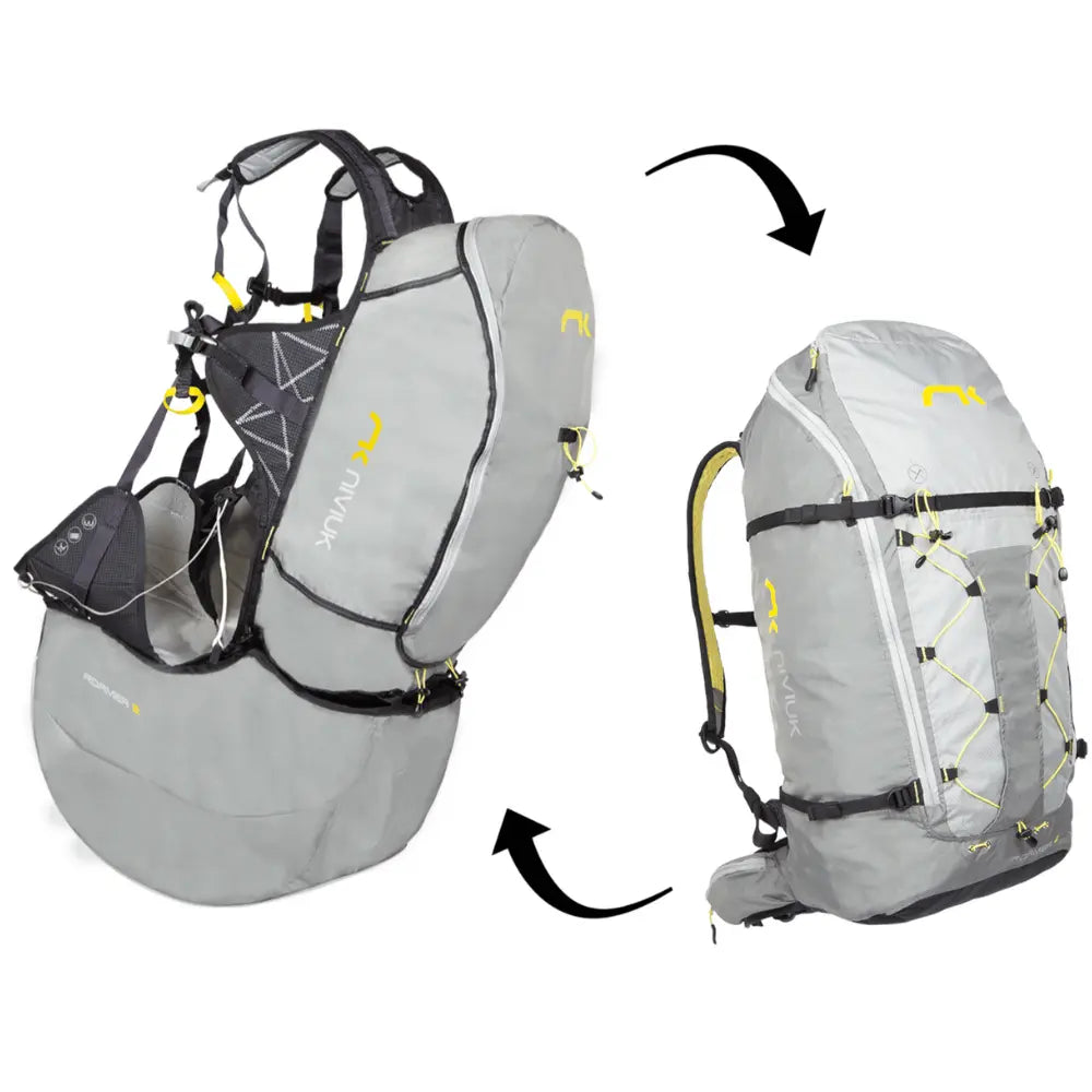 Niviuk Roamer 2 Hike&Fly Gurtzeug, grauer Rucksack mit gelben Akzenten, bietet innovative Lastverteilung und hohen Komfort für Paragliding-Abenteuer.