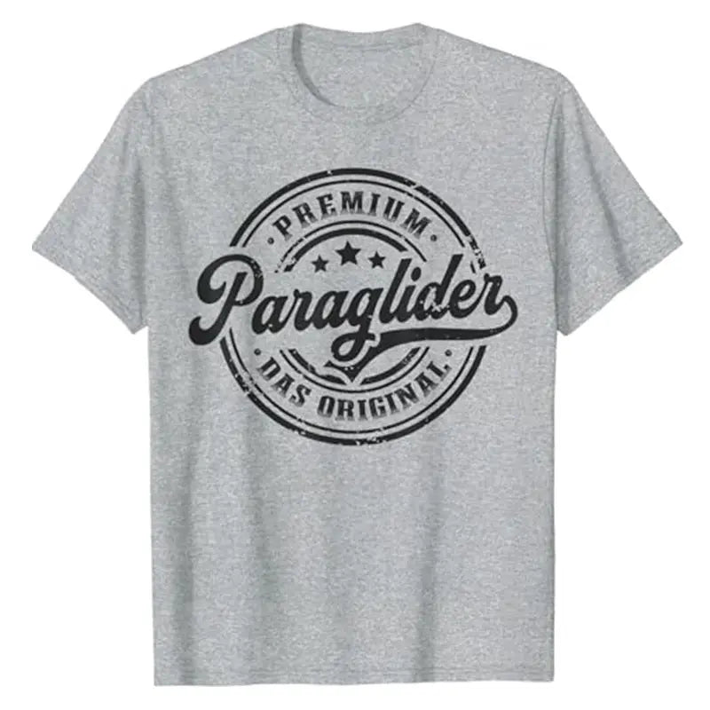 Graues Paragliding T-Shirt Original mit schwarzem Text, ideal für Gleitschirmflieger, aus 100% Baumwolle, klassischer Schnitt, perfekt für Sportliebhaber und als Geschenk.