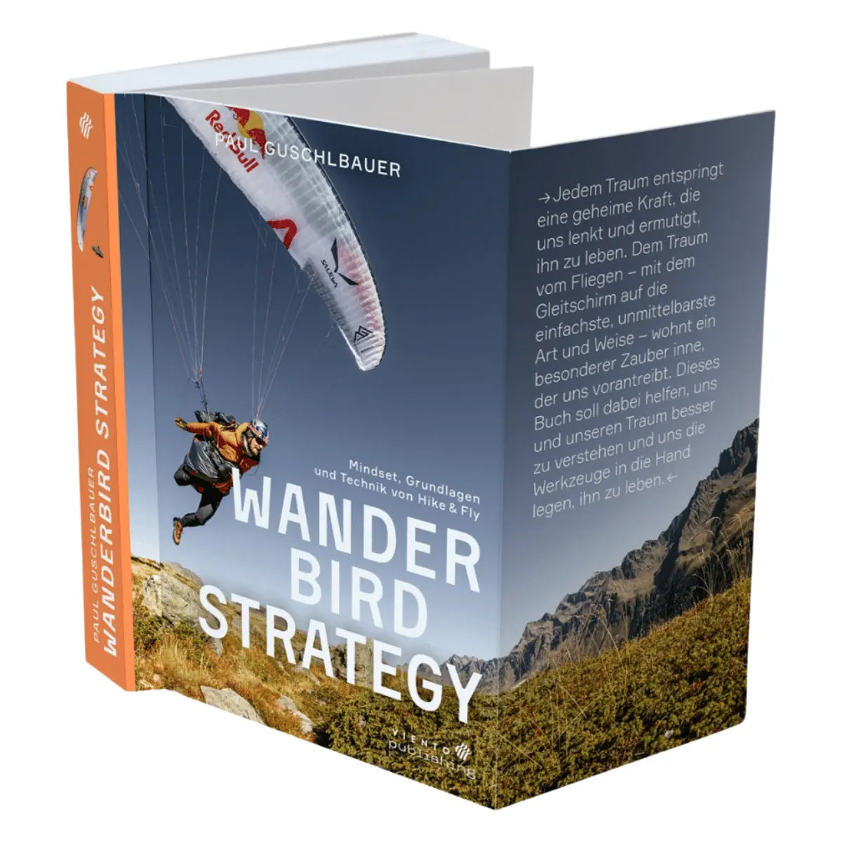 Buchcover von "Wanderbird Strategie von Paul Guschlbauer" mit einem Gleitschirmflieger in orangefarbener Kleidung beim Hike & Fly über felsigem Gelände und blauem Himmel.