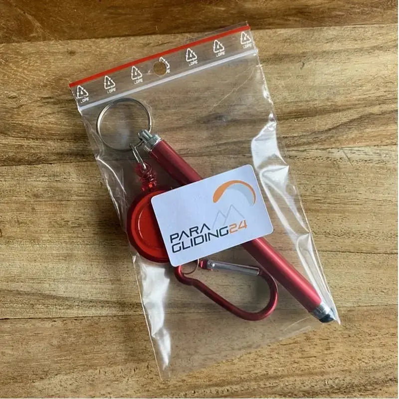 XC StylusPen - Perfekt für die Jacke! Roter Stift in Plastiktasche mit Rollon-Karabiner, ideal für Gleitschirmfliegen und mobile Geräte.
